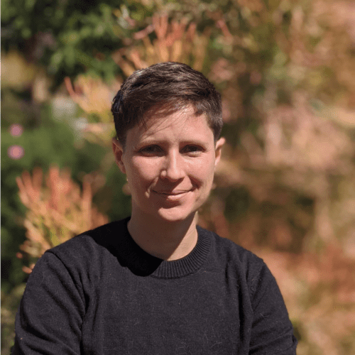 Dax Goldstein, short brown hair, in a black long sleeve shirt