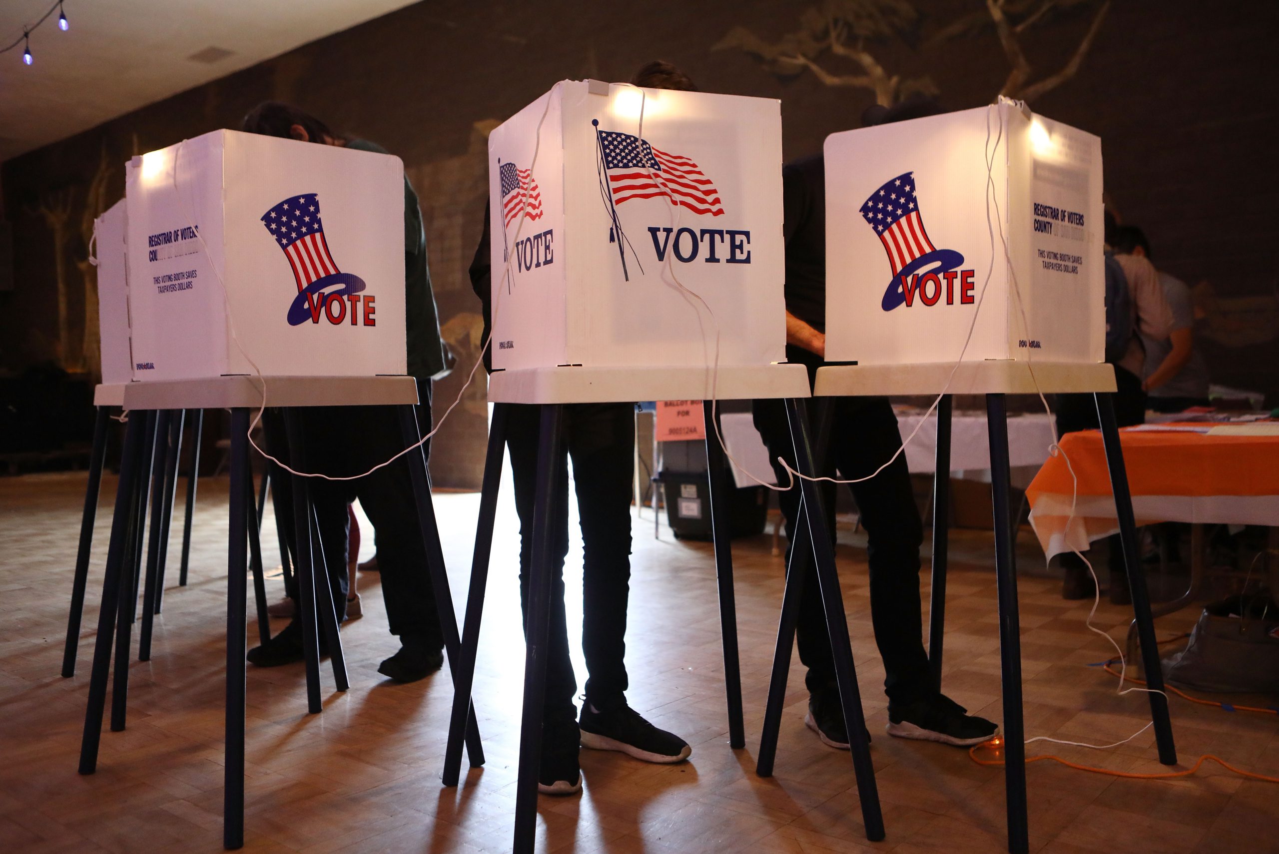 Voters cast their ballots at a Masonic Lodge on June 5, 2018 in Los Angeles, California. California could play a determining role in upsetting Republican control the U.S. Congress, as Democrats hope to win 10 of the 14 seats held by Republicans. (Photo by Mario Tama/Getty Images)